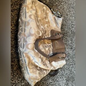 Tan with gold straps Coach bag